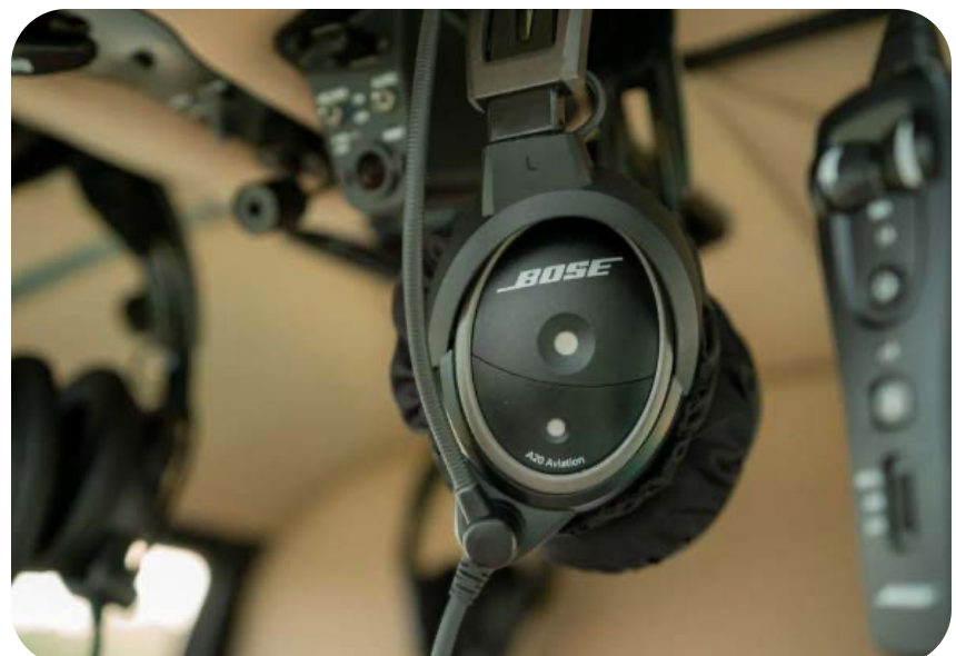 Noise-cancelling aviation headset in the cabin
