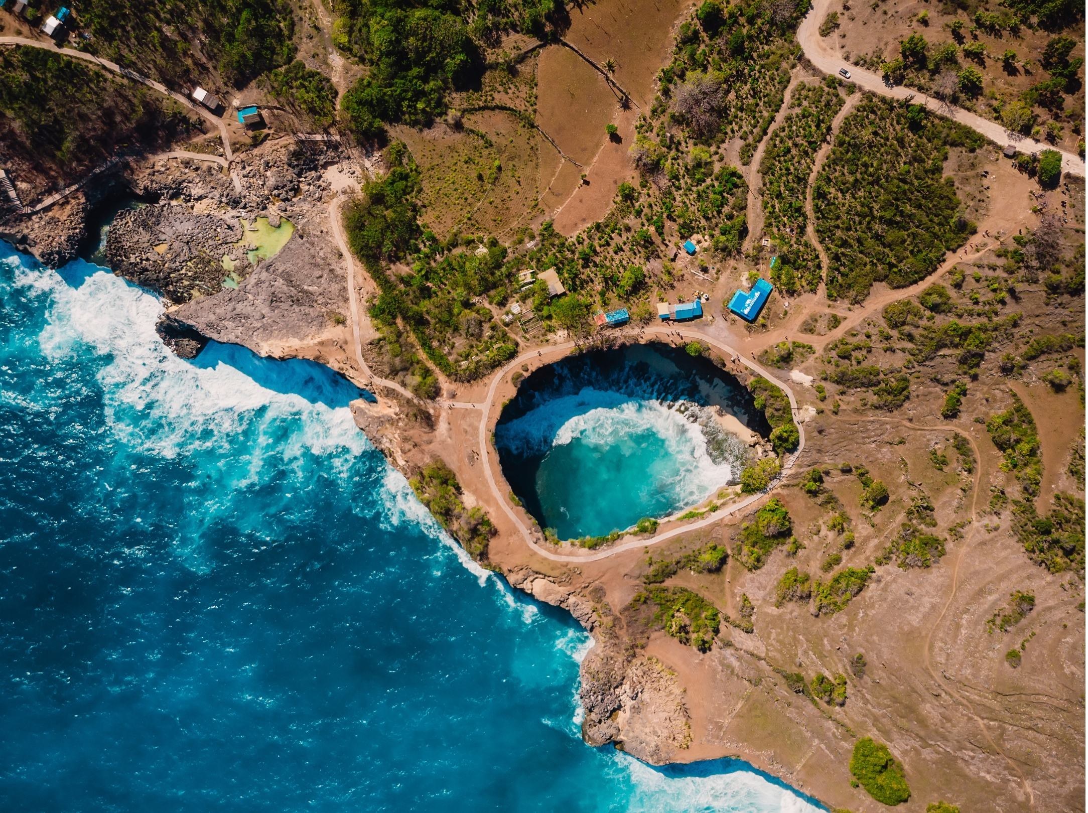 A turquoise tidal pool in the limestone coast of Nusa Penida